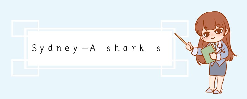 Sydney—A shark savaged a schoolboy's leg w